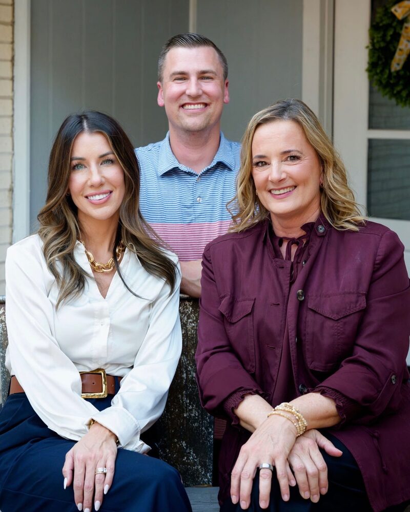 Sara Veillon, Austin Weber and Jennifer West, the founders of Mental Health Counseling Group, seated together outside one of the practice's offices